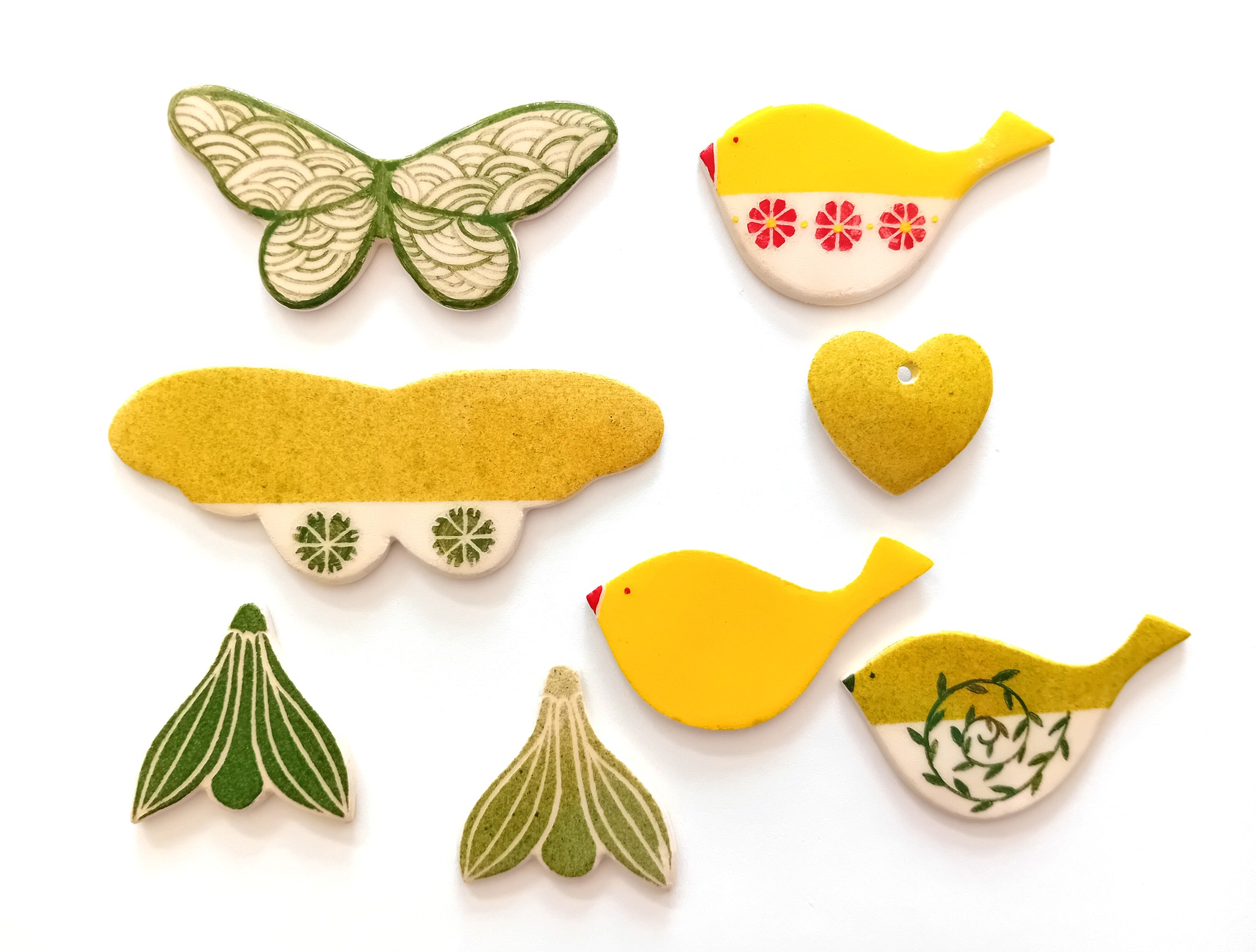 Delicate handmade ceramics ornaments inspired by nature, crafted by Oana 